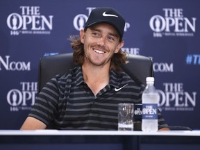 English golfer Tommy Fleetwood smiles during a press conference in the second practice day at the British Open Golf Championship at Royal Birkdale in Southport, England, Monday, July 17, 2017. (AP Photo/Dave Thompson)