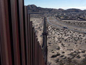 A fence separating the towns of Anapra, Mexico and Sunland Park, New Mexico.