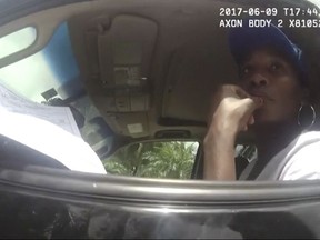 This photo taken from a body camera on June 9, 2017, shows tennis star Venus Williams listening to Palm Beach Gardens Police Officer Davis Dowlings following a car crash in Palm Beach Gardens, Fla. The crash fatally injured an elderly man. Palm Beach Gardens police say the investigation remains open and no fault has been assigned. The estate of the man killed filed a wrongful death lawsuit against Williams on June 30. (Palm Beach Gardens Police Department via AP)