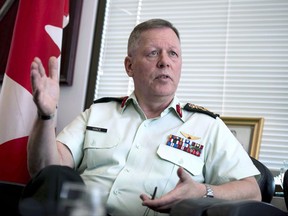 Chief of the Defence Staff Gen. Jonathan Vance is shown in his office in Ottawa on Thursday, June 8, 2017. Canada's top general has condemned the actions of a group of Armed Forces members who disrupted a spiritual event on Canada Day marking the suffering of Indigenous Peoples at a statue of Halifax's controversial founder, Edward Cornwallis. THE CANADIAN PRESS/Justin Tang