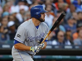 Kansas City Royals' Mike Moustakas hits a sacrifice fly against the Detroit Tigers in the fourth inning of a baseball game in Detroit, Monday, July 24, 2017. (AP Photo/Paul Sancya)