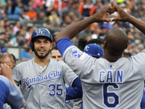 Kansas City Royals' Eric Hosmer (35) returns to the dugout after scoring on an Alcides Escobar single against the Detroit Tigers during the second inning of a baseball game Wednesday, July 26, 2017, in Detroit. (AP Photo/Paul Sancya)