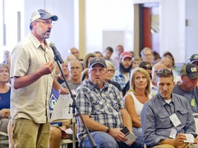 Christopher Grobbel, of Grobbel Environmental and Planning Associates, speaks during feedback session on Enbridge Inc.'s Line 5 at the Hagerty Center on the Great Lakes Campus of Northwestern Michigan College in Traverse City, Mich., Monday, July 24, 2017. Supporters and opponents of twin oil pipelines beneath the Straits of Mackinac are making their cases in a series of public meetings. (Jan-Michael/Traverse City Record-Eagle via AP)