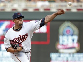 Minnesota Twins starting pitcher Adalberto Mejia throws to the New York Yankees during the first inning of a baseball game Monday, July 17, 2017, in Minneapolis. (AP Photo/Bruce Kluckhohn)