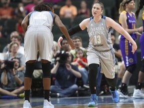 Minnesota Lynx guard Lindsay Whalen celebrates a basket during the second quarter against the Los Angeles Sparks in a WNBA basketball game Thursday, July 6, 2017, in St. Paul, Minn. (Elizabeth Flores/Star Tribune via AP)