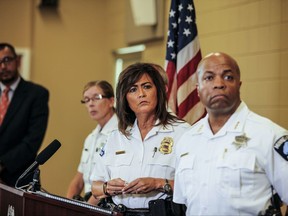 Minneapolis police chief Janee Harteau, center, stands with police inspector Kathy Waite, left, and assistant chief Medaria Arradondo during a news conference Thursday, July 20, 2017, Minneapolis. The family of an Australian woman shot dead by a Minneapolis police officer wants changes in police protocols, including a look at how often officers are required to turn on their body cameras, a family attorney told local media. (Maria Alejandra Cardona/Minnesota Public Radio via AP)