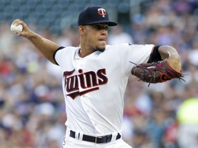 Minnesota Twins starting pitcher Jose Berrios throws during the during the first inning of the team's baseball game against the Baltimore Orioles, Thursday, July 6, 2017, in Minneapolis. (AP Photo/Paul Battaglia)