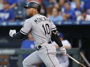 Chicago White Sox's Yoan Moncada watches a three-run triple against the Kansas City Royals during the third inning of a baseball game in Kansas City, Mo., Friday, July. 21, 2017. (AP Photo/Colin E. Braley)