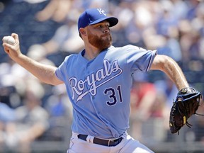 Kansas City Royals starting pitcher Ian Kennedy throws during the second inning of a baseball game, Sunday, July 16, 2017, in Kansas City, Mo. (AP Photo/Charlie Riedel)