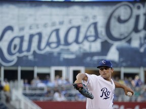 Kansas City Royals starting pitcher Jason Vargas throws during the first inning of the team's baseball game against the Detroit Tigers on Monday, July 17, 2017, in Kansas City, Mo. (AP Photo/Charlie Riedel)
