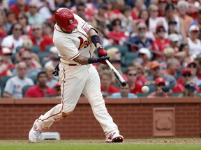 St. Louis Cardinals' Yadier Molina hits an RBI double during the sixth inning of a baseball game against the New York Mets, Saturday, July 8, 2017, in St. Louis. (AP Photo/Jeff Roberson)