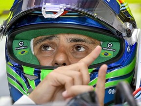 Brazilian Formula One driver Felipe Massa of Team Williams makes a pit stopduring the first practice session at the Hungaroring racetrack in Mogyorod, northeast of Budapest, Hungary, Friday July 28, 2017. The Hungarian Formula One Grand Prix will be held on Sunday July, 30. (Zsolt Czegledi/MTI via AP)