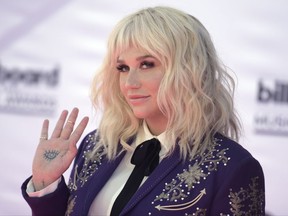 FILE - In this May 22, 2016, file photo, Kesha arrives at the Billboard Music Awards at the T-Mobile Arena in Las Vegas. Kesha released "Praying" on July 6, 2017. The song is the lead single from the singer's first album in five years. (Photo by Richard Shotwell/Invision/AP, File)