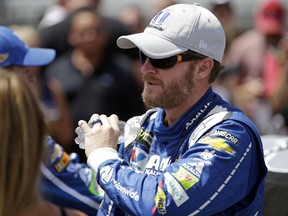 Dale Earnhardt Jr. (88) prepares before the NASCAR Brickyard 400 auto race at Indianapolis Motor Speedway in Indianapolis, Sunday, July 23, 2017. (AP Photo/AJ Mast)