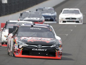 Race driver Kyle Busch drives into turn one during the NASCAR Xfinity auto race at Indianapolis Motor Speedway, in Indianapolis Saturday, July 22, 2017. (AP Photo/Darron Cummings)