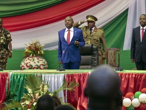 FILE - In this Thursday, Aug. 20, 2015 file photo, Burundi's President Pierre Nkurunziza is sworn in for a third term at a ceremony in the parliament in Bujumbura, Burundi. Hundreds of people have been killed and hundreds of thousands have fled the small East African nation in the two years since President Pierre Nkurunziza set off protests by declaring he would seek another term. (AP Photo/Gildas Ngingo, File)