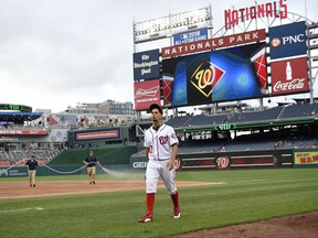 Washington Nationals starting pitcher Gio Gonzalez walks on the field before the team's baseball game against the Atlanta Braves, Thursday, July 6, 2017, in Washington. The start of the game was delayed. (AP Photo/Nick Wass)