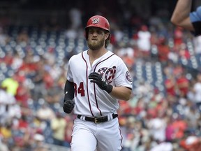 Washington Nationals' Bryce Harper trots home after he hit a two-run home run during the first inning of a baseball game against the Milwaukee Brewers, Thursday, July 27, 2017, in Washington. (AP Photo/Nick Wass)