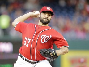 Washington Nationals starting pitcher Tanner Roark pitches during the first inning of a baseball game between the Colorado Rockies and Washington Nationals, Saturday, July 29, 2017, in Washington. (AP Photo/Mark Tenally)