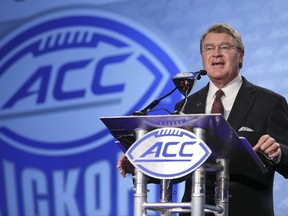 ACC Commissioner John Swofford speaks to the media during the Atlantic Coast Conference NCAA college football media day in Charlotte, N.C., Thursday, July 13, 2017. (AP Photo/Chuck Burton)