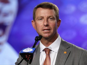 Clemson coach Dabo Swinney speaks to reporters during the Atlantic Coast Conference NCAA college football media day in Charlotte, N.C., Thursday, July 13, 2017. (AP Photo/Chuck Burton)