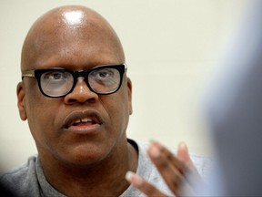 FILE - In an Tuesday, Aug. 26, 2014 file photo, Leon Brown speaks with a reporter at the Maury Correctional Institution in Maury, N.C., about his incarceration.   Lawyer fees and high-interest loans are threatening the financial futures of the two North Carolina brothers who have collected hundreds of thousands of dollars for their three decades of wrongful imprisonment, a court-appointed advocate said Wednesday, July 26, 2017.  The advocate argued in a legal motion that Brown and Henry McCollum were steered into dubious financial arrangements by lawyers who stand to profit from the men's lawsuit against the investigators who put them behind bars.  (Chuck Liddy/The News & Observer via AP)