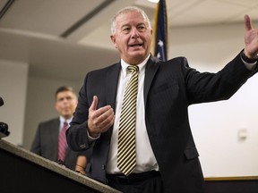 Douglas County Attorney Don Kleine announces during a news conference in Omaha, Neb., Wednesday, July 26, 2017 that two Omaha police officers, Scotty Payne and Ryan McClarty, will be charged with assault in the death last month of 29-year-old Zachary Bearheels, a mentally ill Oklahoma man who was shocked with a stun gun a dozen times.   Payne and McClarty were fired from the Omaha Police Department this month based on the recommendation of police Chief Todd Schmaderer.  (AP Photo/Nati Harnik)