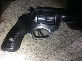This image provided by the NYPD shows a gun recovered after a fatal shooting of an officer in the Bronx section of New York, Wednesday, July 5, 2017. Police said other officers shot and killed the suspect after he drew a revolver on them. (NYPD via AP)