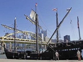 FILE- In this Sept. 20, 2012, file photo, a larger scale replica of the Pinta, is moored on the north shore of the Allegheny River in Pittsburgh near the replica of the Nina. The replicas of two of Christopher Columbus' ships, the Nina and Pinta, will be docked Thursday, July 6, 2017, at Newburgh, N.Y., and will be open to tours Friday through Tuesday before setting sail early Wednesday. (AP Photo/Keith Srakocic, File)