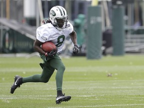 New York Jets wide receiver Lucky Whitehead runs with the ball during NFL football training camp during NFL football training camp, Saturday, July 29, 2017, in Florham Park, N.J. (AP Photo/Julio Cortez)