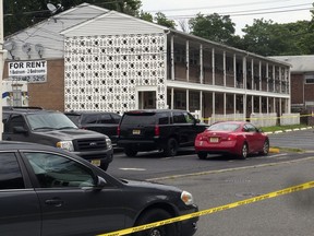 Police tape cordons off the scene where the body of 11-year-old Abbiegail "Abbie" Smith was found Thursday, July 13, 2017, in Keansburg, N.J. Authorities in New Jersey say the11-year-old girl reported missing was found dead near her apartment complex, and police are investigating her death as a homicide. (Patti Sapone/NJ Advance Media via AP)