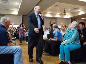 FILE - In this March 18, 2017, file photo, U.S. Rep. Steve Pearce, walks through a crowded Ventana room at the New Mexico Farm and Ranch Heritage Museum during a town hall meeting in Las Cruces, N.M. Pearce is running for governor of New Mexico in 2018 while giving up his hold on a congressional district along the U.S.-Mexico border. Pearce announced Monday, July 10, he will seek the GOP nomination in an attempt to succeed second-term GOP Gov. Susana Martinez. (Josh Bachman/The Las Cruces Sun-News via AP)