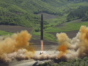 This photo distributed by the North Korean government shows what was said to be the launch of a Hwasong-14 intercontinental ballistic missile, ICBM, in North Korea's northwest, Tuesday, July 4, 2017. Independent journalists were not given access to cover the event depicted in this photo. North Korea claimed to have tested its first intercontinental ballistic missile in a launch Tuesday, a potential game-changing development in its push to militarily challenge Washington -- but a declaration that conflicts with earlier South Korean and U.S. assessments that it had an intermediate range. (Korean Central News Agency/Korea News Service via AP)