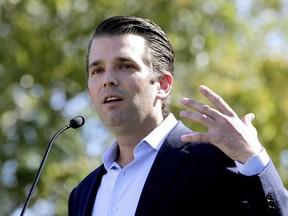 FILE - In this Friday, Nov. 4, 2016 file photo, Donald Trump Jr. campaigns for his father Republican presidential candidate Donald Trump in Gilbert, Ariz.  Donald Trump's eldest son, son-in-law and then-campaign chairman met with a Russian lawyer shortly after Trump won the Republican nomination, in what appears to be the earliest known private meeting between key aides to the president and a Russian. Representatives of Donald Trump Jr. and Jared Kushner confirmed the June 2016 meeting to The Associated Press after The New York Times reported Saturday, July 8, 2017 on the gathering of the men and Russian lawyer Natalia Veselnitskaya at Trump Tower. (AP Photo/Matt York, File)