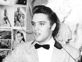 In this April 30, 1956, file photo, Elvis Presley is shown at the New Frontier Hotel in Las Vegas. One of the first stages Elvis sang on has been refinished during the renovation of the auditorium at his elementary school in Tupelo, Miss., the Northeast Mississippi Daily Journal reported Friday, July 21, 2017. Elvis Presley Birthplace employee Judy Schumpert says the rock 'n' roll king's time at Lawhon was instrumental in helping him pursue music as a boy. Schumpert says Presley's fifth-grade teacher, Oleta Grimes, entered him in his first talent competition.(AP Photo/File)