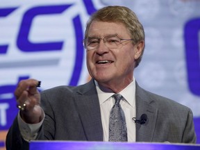 In this Wednesday, Oct. 26, 2016 file photo, ACC Commissioner John Swofford answers a question during the Atlantic Coast Conference NCAA college basketball media day in Charlotte, N.C. The Atlantic Coast Conference won big in football in 2016. So it's fitting the league starts its annual preseason media days by featuring reigning national champion Clemson and Heisman Trophy winner Lamar Jackson of Louisville. The league opens its two-day event in Charlotte on Thursday morning, July 13, 2017 beginning with a state-of-the-league forum from Commissioner John Swofford. (AP Photo/Bob Leverone, File)