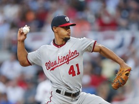 FILE - In this April 19, 2017, file photo, Washington Nationals starting pitcher Joe Ross works against the Atlanta Braves during a baseball game in Atlanta. Ross will have Tommy John surgery and miss the rest of the season. Dr. Keith Meister will operate on Wednesday, July 19, in Texas, according to Washington manager Dusty Baker. (AP Photo/John Bazemore, File)