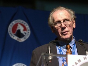 In this Jan. 29, 2007, photo provided by the American Hockey League, Dick Gamble speaks during AHL Hall of Fame induction ceremonies in Toronto. A scuba-diving treasure hunter who found an American Hockey League Hall of Fame ring in one of New York's Finger Lakes is returning it to its owner. Gary Gavurnik, of Auburn, New York, plans to return the prized ring to former AHL star Dick Gamble on Monday, July 24, 2017. Gavurnik found it with a metal detector in Canandaigua Lake over the Fourth of July weekend. (Graig Abel/AHL via AP)