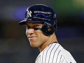 FILE - In this May 23, 2017, file photo, New York Yankees Aaron Judge reacts after drawing a walk in a baseball game against the Kansas City Royals at Yankee Stadium in New York. This time last year, Aaron Judge had played exactly zero big-league games. The New York Yankees' rookie slugger is now an All-Star and MVP hopeful. Big things are happening for one of baseball's biggest men. (AP Photo/Kathy Willens, File)