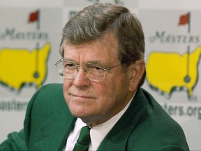 FILE - This April 10, 2002, file photo shows Hootie Johnson, then-chairman of the Augusta National Golf Club, during a news conference at the Augusta National Golf Club in Augusta, Ga. Hootie Johnson, the South Carolina banker who as chairman of Augusta National stood his ground on inviting female members, has died. Augusta National said Johnson died Friday morning, July 14, 2017. He was 86. (AP Photo/Elise Amendola, File)