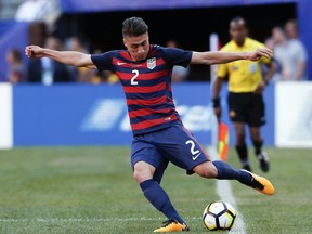 FILE - In this Saturday, July 15, 2017, file photo, United States' Jorge Villafana (2) makes a pass against Nicaragua during a CONCACAF Gold Cup soccer match in Cleveland. U.S. coach Bruce Arena has used 47 players in 14 games since replacing Jurgen Klinsmann last November, including seven who made their national team debuts. He redefined roles of Clint Dempsey, Michael Bradley and Fabian Johnson, and boosted Jorge Villafana and Kellyn Acosta to the top tier of his depth chart.  (AP Photo/Ron Schwane, File)