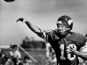 FILE - In this Aug. 9, 1978, file photo, Minnesota Vikings quarterback Fran Tarkenton passes at training camp in Mankato, Minn. The Minnesota Vikings say the 52nd training camp in Mankato will be their last one away from headquarters. The Vikings announced on Tuesday, July 18, 2017, that they plan to hold training camp at their new practice facility in the Twin Cities suburb of Eagan starting in 2018. (AP Photo/Jim Mone, File)