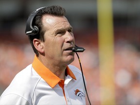 FILE - In this Sept. 13, 2015, file photo, then-Denver Broncos head coach Gary Kubiak watches during the first half of an NFL football game against the Baltimore Ravens, in Denver. A person with knowledge of the hire has told The Associated Press that Gary Kubiak, who stepped down as Denver's head coach because of health concerns seven months ago, is returning to the Broncos in a scouting capacity. The person, who spoke on condition of anonymity Tuesday, July 25, 2017, because the hire hadn't been announced, said Kubiak will serve as a senior personnel adviser, scouting college and pro players. (AP Photo/Jack Dempsey, File)