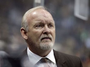 FILE - In this Jan. 14, 2017, file photo, Dallas Stars head coach Lindy Ruff watches play against the Minnesota Wild in the first period of an NHL hockey game in Dallas. The Rangers have hired longtime NHL head coach Lindy Ruff as an assistant to Alain Vigneault. The 57-year-old Ruff has been an NHL head coach for the past 19 seasons with a record of 736-554-78-125. (AP Photo/LM Otero, File)