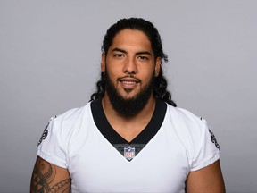 This is a 2017 file photo showing Kikaha Hau'oli of the New Orleans Saints NFL football team. Saints defensive end Hau'oli Kikaha appreciates the skepticism surrounding his ability to come back from a third left anterior cruciate ligament tear. The 2015 second-round draft pick, who set sack records at Washington, is nonetheless determined to reward the faith New Orleans has shown in him by keeping him around. (AP Photo/File)