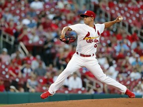 FILE - In this June 13, 2017, file photo, St. Louis Cardinals starting pitcher Marco Gonzales throws during the first inning in the second game of a baseball doubleheader against the Milwaukee Brewers, in St. Louis. The Seattle Mariners paid a hefty price in their attempt to add pitching depth that may not be ready to help them in the playoff hunt this season.  The Mariners acquired young left-hander Marco Gonzales from the St. Louis Cardinals on Friday, July 21, 2017, in exchange for top outfield prospect Tyler O'Neill, the second move to add pitching depth in as many days by Seattle. The Mariners acquired veteran reliever David Phelps from Miami on Thursday. (AP Photo/Jeff Roberson, File)