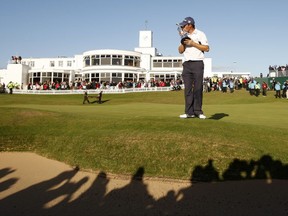 FILE - In this Sunday, July 20, 2008, file photo, Padraig Harrington, of Ireland, kisses the trophy after winning the British Open Golf championship, at the Royal Birkdale golf course, in Southport, England. First-timers have won the last seven majors. The British Open starts July 20, 2017, and Royal Birkdale has a history or rewarding players who already have won majors. (AP Photo/Jon Super, File)