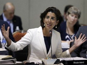 FILE - In this Monday, Aug. 29, 2016, file photo, Rhode Island Gov. Gina Raimondo speaks during a conference of New England's governors and eastern Canada's premiers to discuss closer regional collaboration in Boston. Ahead of the July 2017 governor's meeting, Raimondo, a Democrat, says she wants to see governors collectively say they will commit their states to the standards in the Paris accord and that she thinks they can work directly with world leaders to address the problem. (AP Photo/Elise Amendola, File)