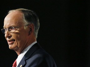 FILE - In this Tuesday, Feb. 7, 2017, file photo, Alabama Gov. Robert Bentley speaks during the annual State of the State address at the Capitol, in Montgomery, Ala. Bentley went to court trying to regain the pistol permit he lost after pleading guilty to misdemeanor charges and resigning. Court records show Bentley filed an appeal Tuesday, July 11, 2017, challenging the Tuscaloosa County Sheriff's Office decision to revoke his gun permit. (AP Photo/Brynn Anderson, File)