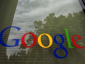 FILE- In this Thursday, April 12, 2012, file photo, a Google logo is displayed at the headquarters in Mountain View, Calif. On Friday, July 14, 2017, an administrative law judge ruled that Labor Department officials investigating gender pay bias had asked Google for data in a way that's too broad and intrusive on employee privacy. Google must still provide data, including contact information, on 8,000 employees, just not data on the more than 25,000 workers originally sought. (AP Photo/Paul Sakuma, File)